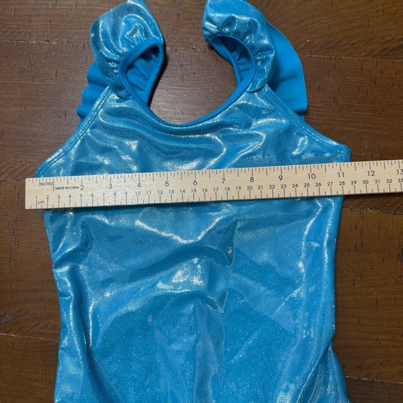 Shimmering Blue Ruffle Swimsuit - Picture 5 of 8